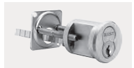 Cylindrical door lock with key cylinder and latch in satin chrome finish, mounted on a door hardware plate