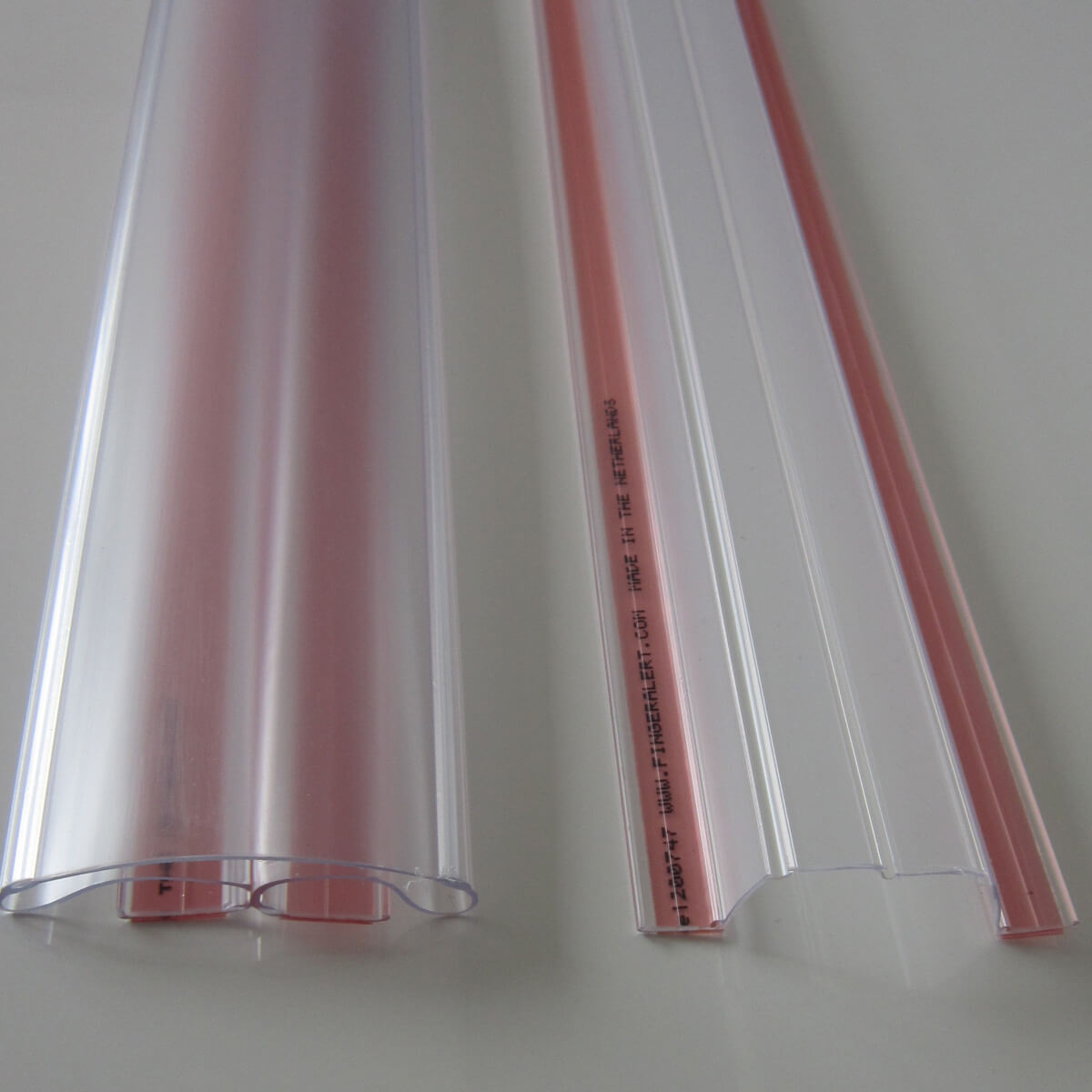 Transparent door edge protectors on white background.