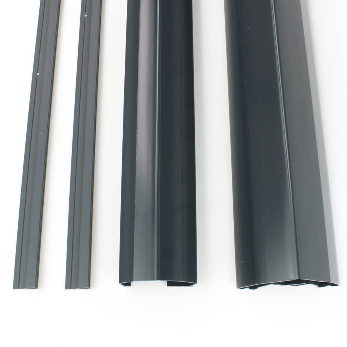 Four black door seals aligned on white background.