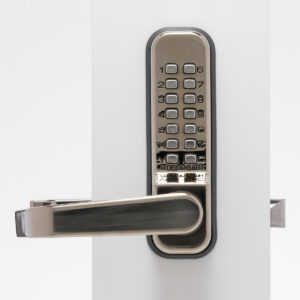 Digital keypad lock with door handle in focus.