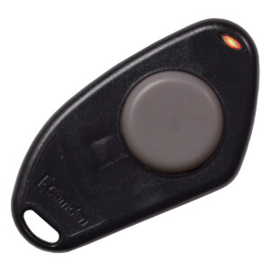 Black key fob with circular button and LED.