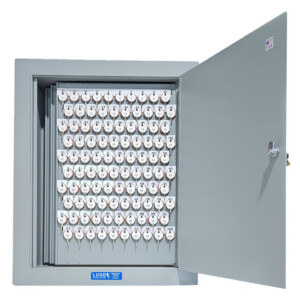 Open key cabinet with numbered key hooks displayed.