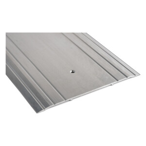 Aluminum threshold plate with grooved surface design.