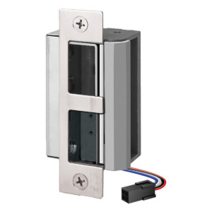 Electric strike lock with exposed wiring connectors.