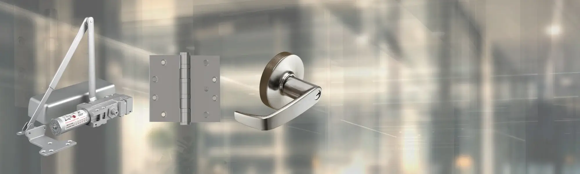 Door closer, hinge, and handle on blurred background.