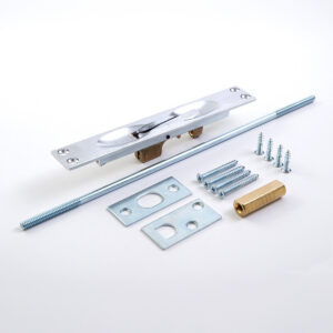 Door hardware components laid out on white surface.