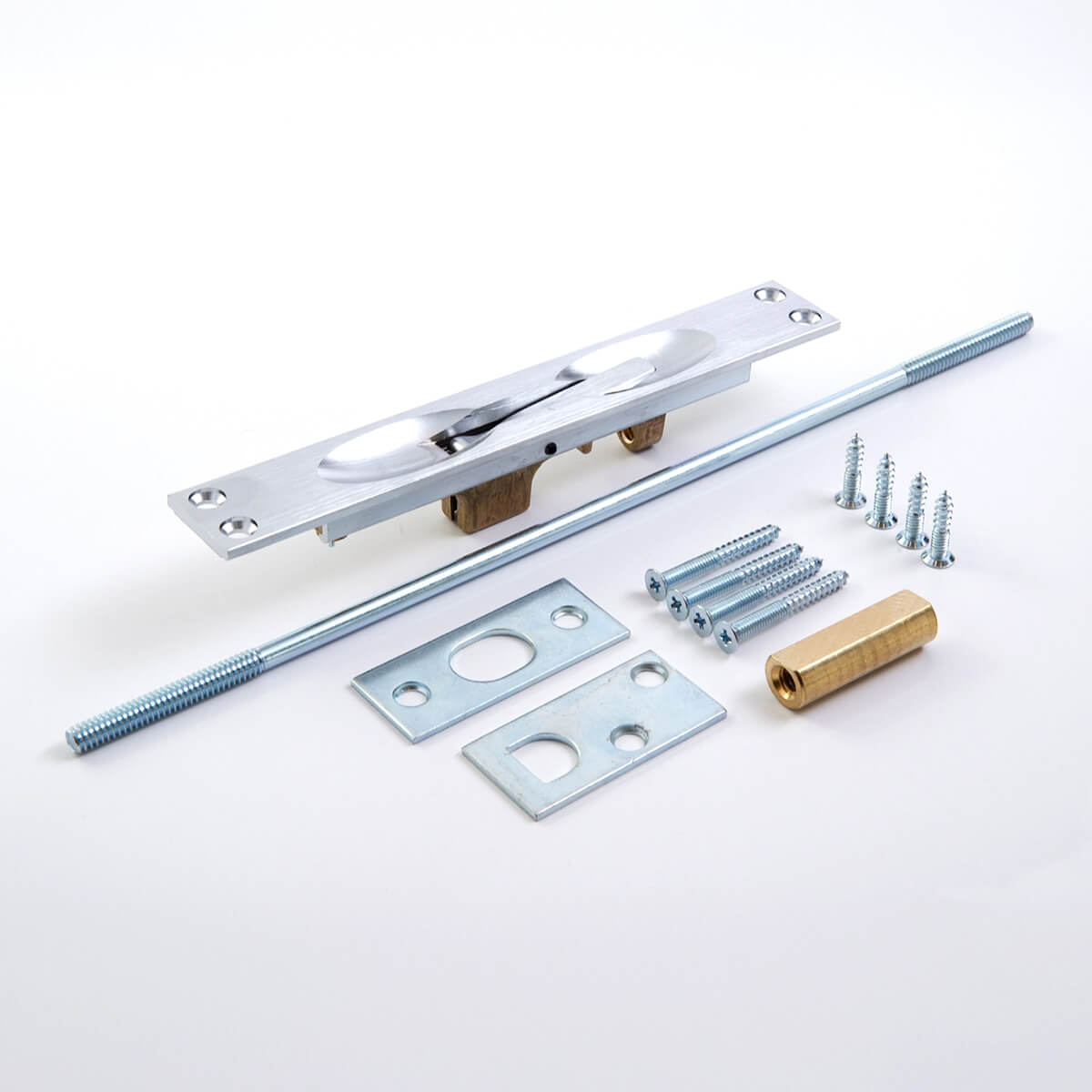 Door hardware components laid out on white surface.