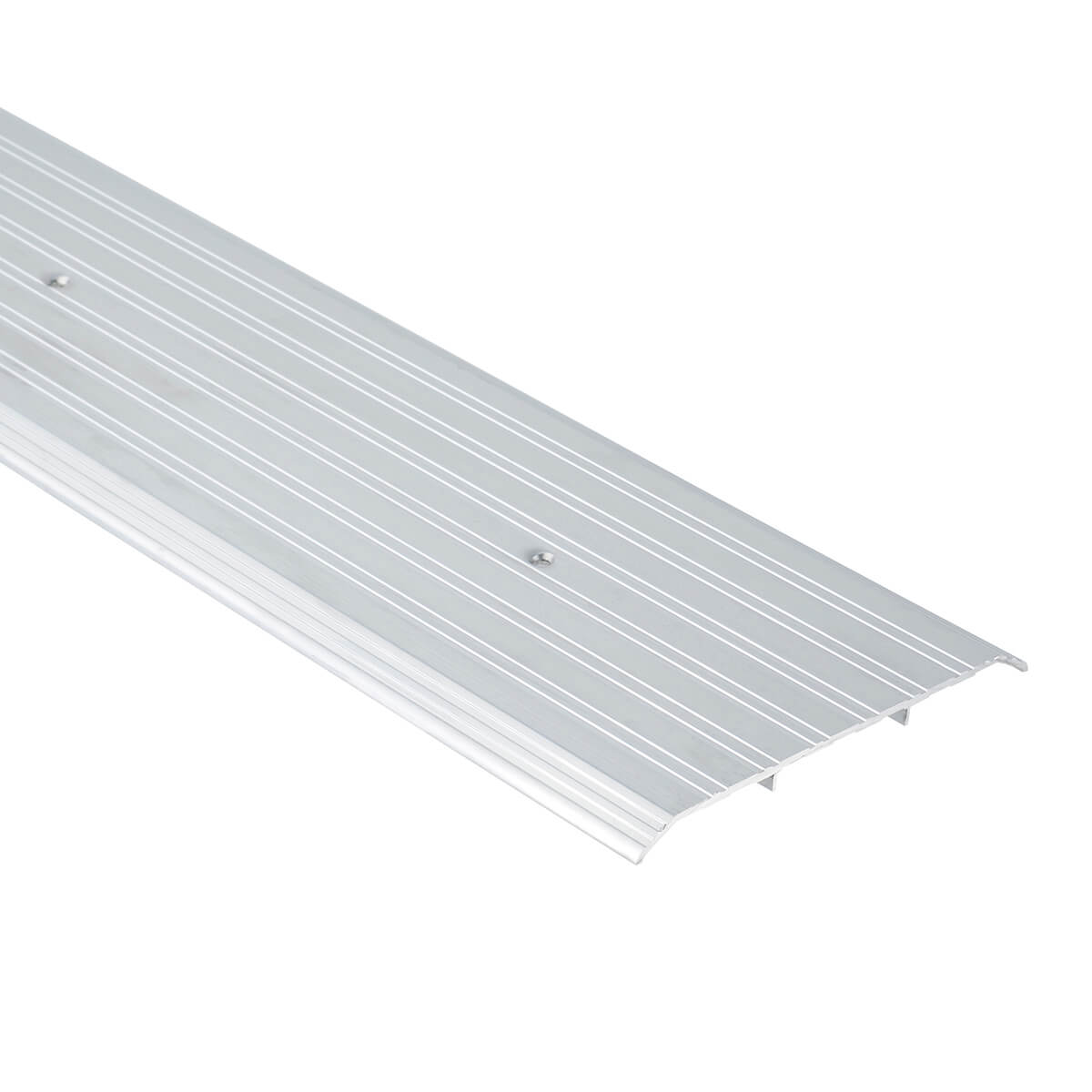 Metallic door threshold with grooved surface.