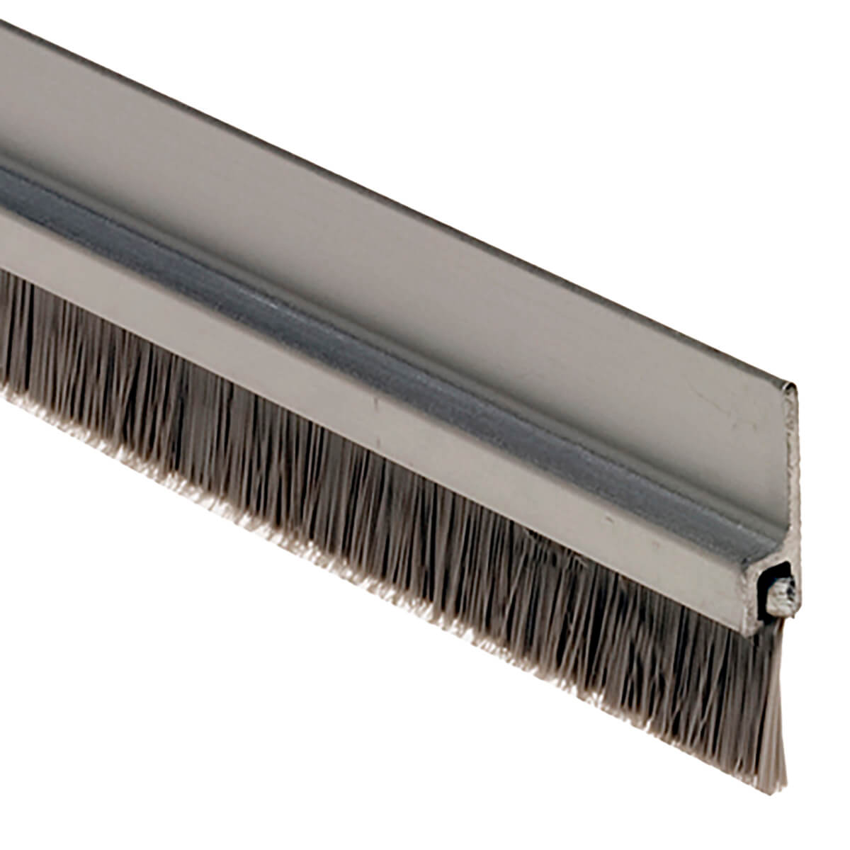 Metal door sweep with brush bristles for sealing.