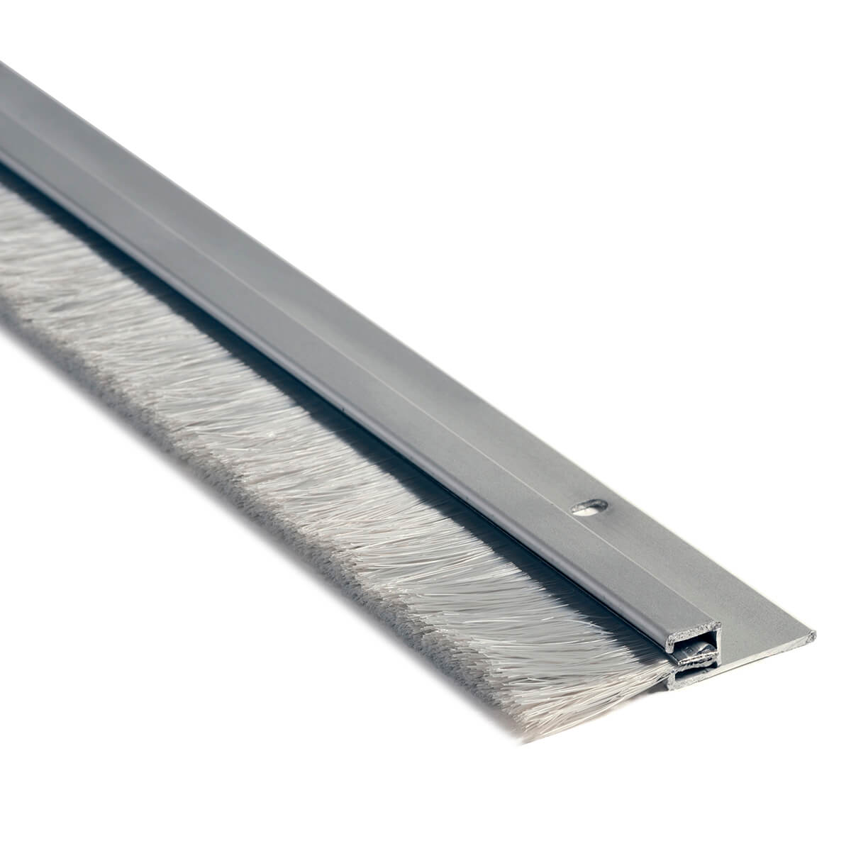 Silver door sweep with bristles, used for sealing.