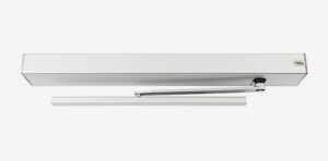 White ceiling-mounted HVAC air conditioner unit with a long rectangular diffuser and a slim downstream vent below.